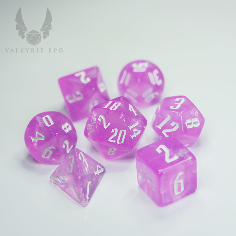 Valkyrie RPG | Online Dice Store UK | Midgard Rose Quartz - Pink hues mixed with several fine colour shifting glitters offering a borealis effect to this wonderful set, complimented by a new font design and white inking.  on white background