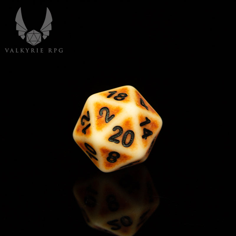Valkyrie RPG | Online Dice Store UK |  Midgard Fissure - Reddish-brown with weathered edges and black ink these dice bring the feel of ancient and worn bones to the table. close up of d20