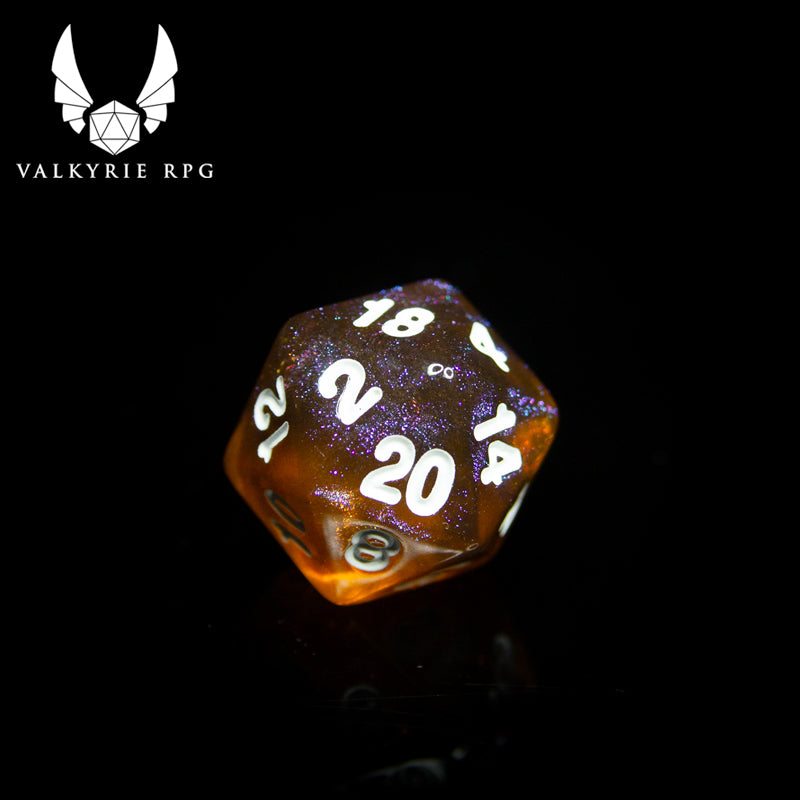 Valkyrie RPG | Online Dice Store UK | Helheim Brass Dragon - Beautiful colour shifting purple and brass toned glitters with blends of deep varying tones of amber finished with white inking. close up of d20