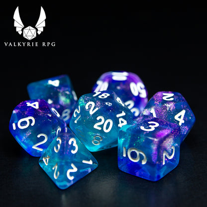 Valkyrie RPG | Online Dice Store UK | Helheim Sea Sprite - Colour shifting purple and silver toned glitters with blends of pale blue and violet along with white inked numbering. on black background
