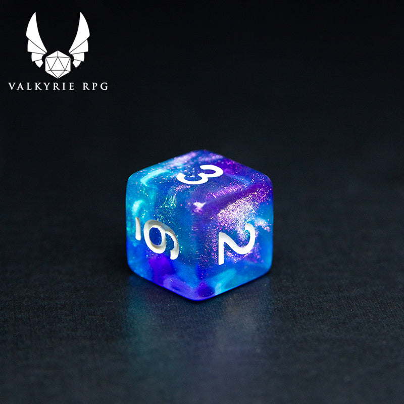 Valkyrie RPG | Online Dice Store UK | Helheim Sea Sprite - Colour shifting purple and silver toned glitters with blends of pale blue and violet along with white inked numbering. close up of d6 on black background